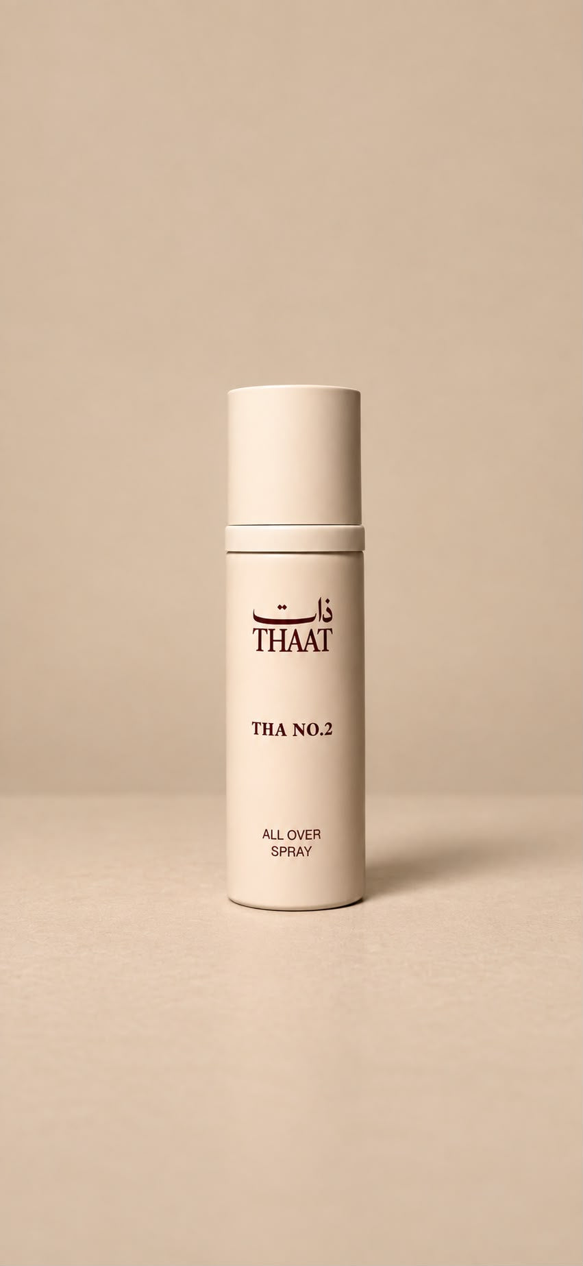 THA NO.2 من ذات — بخاخ All Over Spray بعبوة كريمية — خلفية بيج